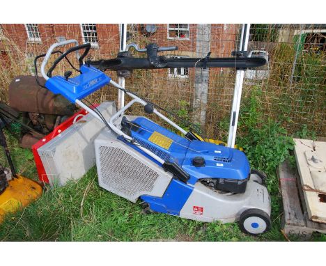 A Yamaha mower with roller and grass box - good compression.
