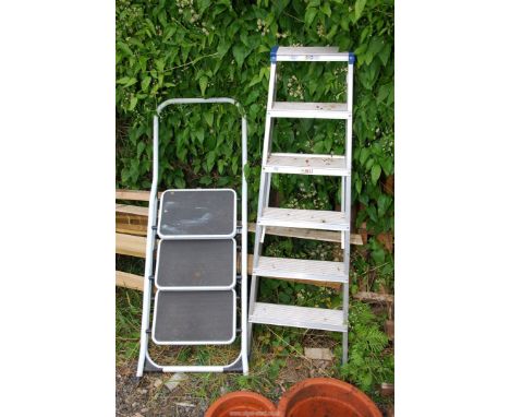A 6 rung aluminium step ladder and a 3 rung step ladder.