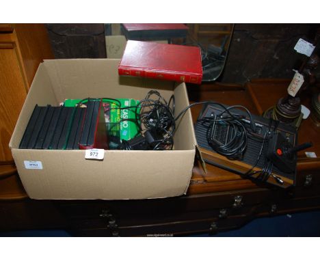 An Atari video computer system games console with games.