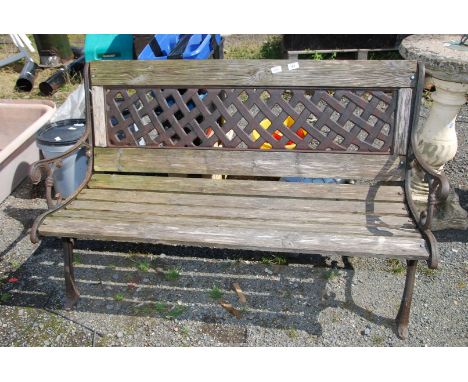A cast iron ended wooden bench, 50" wide x 30" high x 20" deep.