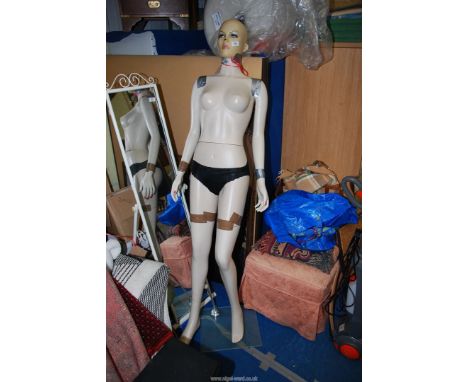 A full-body lady mannequin.