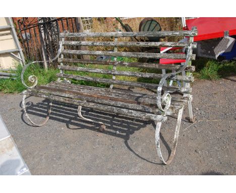 A cast iron ended bench, 66" wide x 35" deep.