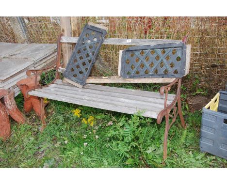 A garden bench with cast iron ends - for restoration.