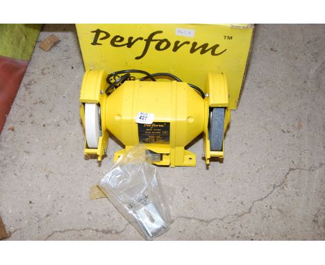 A Perform CCBG Bench Grinder (appears new in box), 6'' stone wheels, etc. 