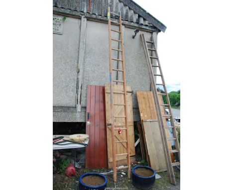 A 15 rung ladder with stays.