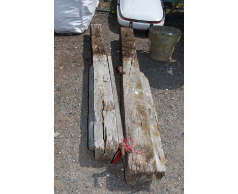 Two Oak gate posts, one with gate hinges. 1 x 8 Ft. long, 1 x 90" long.