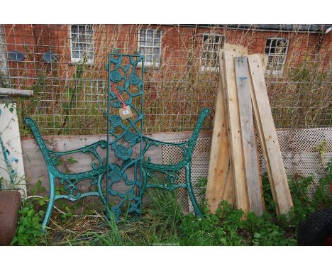 A garden bench with cast iron ends - for assembly.