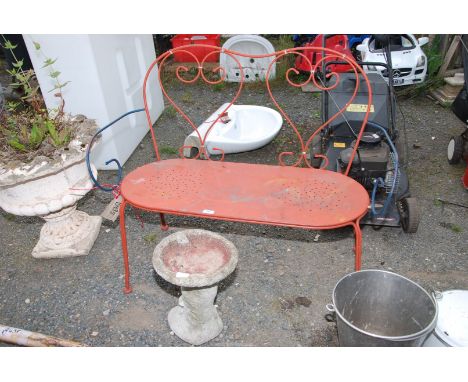 A metal garden bench, 42" wide x 35" high, and a small bird bath, 15" high.