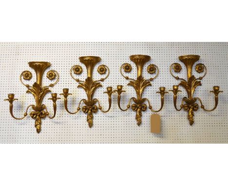 WALL LIGHTS, a set of four, Italian twin light gilt with leaf decoration, 38.5cm W x 52cm H. (4)