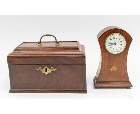 A late Georgian tea caddy in mahogany, together with an Edwardian mahogany mantel clock.