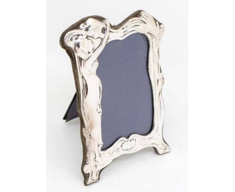 An Art Nouveau style silver photo frame with stylised figural and floral form, hallmarked London, 1989, David Richards and So