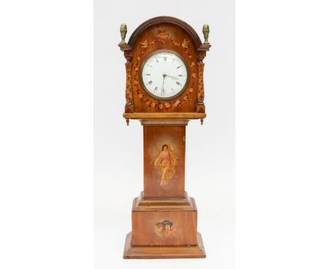 An early 20th century miniature longcase mantel clock with painted detail and Roman and Arabic numerals.