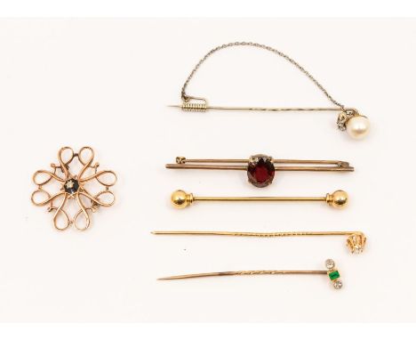 A collection of seven 20th century stick pins/brooches to include a diamond set pin, set with an old cut diamond approx 0.10c