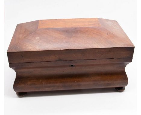 A late Georgian sarcophagus tea caddy in mahogany on bun feet with addition of&nbsp; (probably Victorian) later sugar bowl