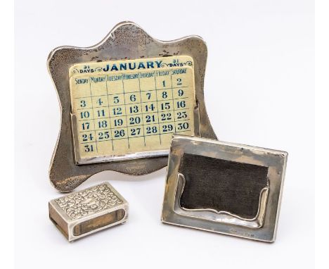An Edwardian silver mounted desk calendar, easel back with melamine printed cards, hallmarked Chester, circa 1904 together wi