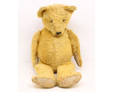 Chiltern: An early 20th century, Chiltern, straw-filled teddy bear, circa 1930s, no labels. Height approx. 26". General condi