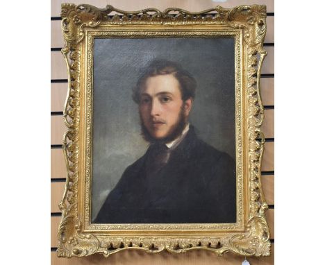 An English School mid 19th century portrait of a gentleman, unsigned, on canvas and relined, and in a gilt pierced frame, 55c