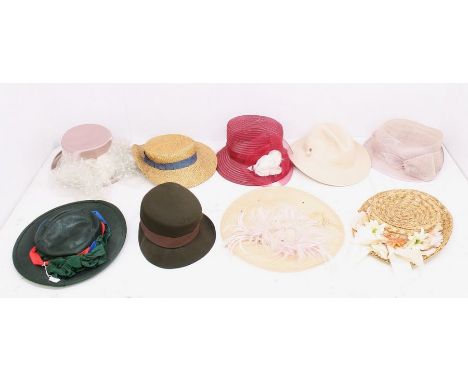 A collection of hats to include: WRACS (Women's Royal Army Corps) military hat; a collection of straw hats in various conditi