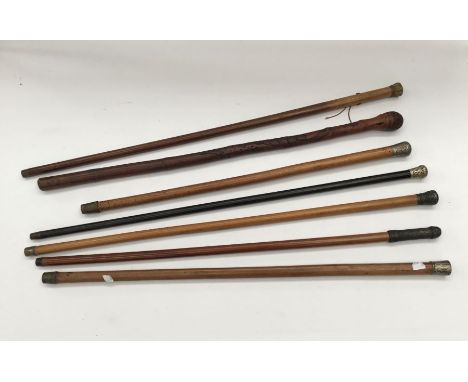 5 x 19th / early 20th century malacca walking canes, 4 of which have white metal pommels, and another with a gilt metal pomme