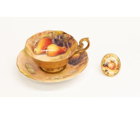 Royal Worcester - a handpainted breakfast cup and saucer with fallen fruits by Ricketts (damage to both) and a brooch in the 