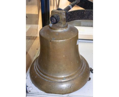 An early 20th Century brass bell on wall mount with ringing chain, the bell 25cm high together with a pair of Georgian style 