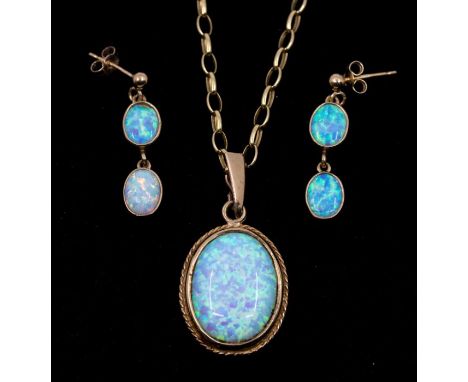 A synthetic opal and 9ct gold oval pendant approx 18 x 22mm, suspended from a 9ct gold belcher chain, length approx 24'', alo