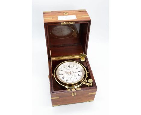 A good marine chronometer by George Hedger 42 Great Sutton Street London. No 4858 with 3 1/2" silvered dial with makers name 