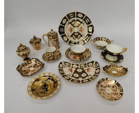 A collection of Royal Crown Derby 2451 Imari, including chocolate pot cups, coffee cans, saucers, plates, vases, pin dishes, 