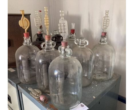 Ten glass Demi-Johns.THIS ITEM IS OFF SITE AND SHOULD BE COLLECTED FROM VENDOR’s ADDRESS WITHIN TWO WEEKS OF SALE (Derby DE21