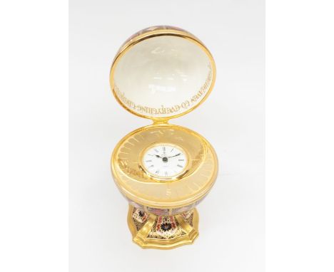 Royal Crown Derby 1128 pattern, boxed Millennium Globe Clock, first qualityCondition: Damage to the lid, which has been re-gl