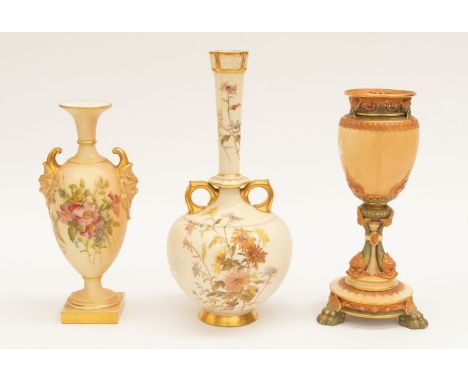 Three Royal Worcester blush ivory vases to include; A pedestal vase of lobed ovoid form, pierced work, on ornate circular pla