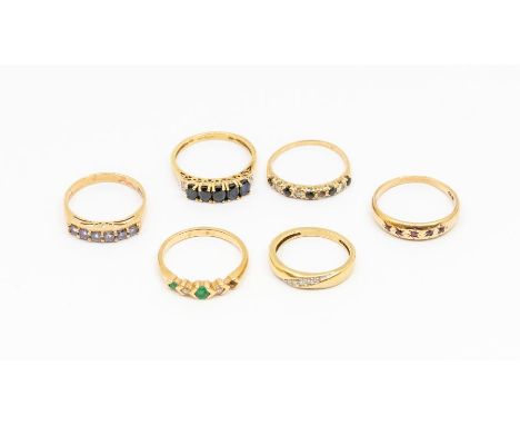 A collection of 9ct gold rings to include sapphire and diamond five stone ring, size N, tanzanite half set eternity ring, siz