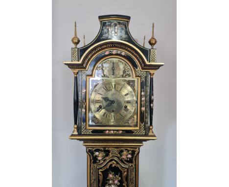 An ebonised and hand painted long case clock with Westminster chime, decorated throughout the body with mother of pearl inlay