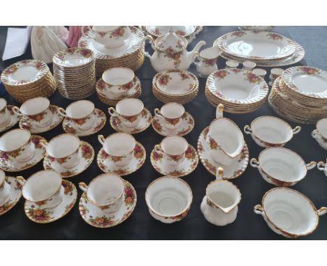 A Royal Albert old country roses dinner service and tea set approximately 130 pieces teapot plates cups and two tureens with 