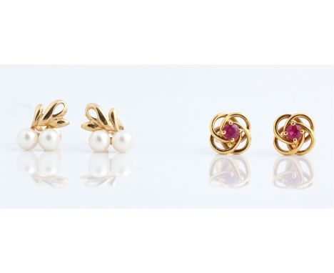 A pair of ruby set knot stud earrings, stamped 375, together with a pair of hallmarked 9ct yellow gold pearl set stud earring