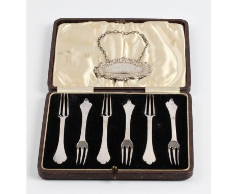 A hallmarked silver whisky decanter label on chain, together with a set of six hallmarked silver pickle forks in case. IMPORT