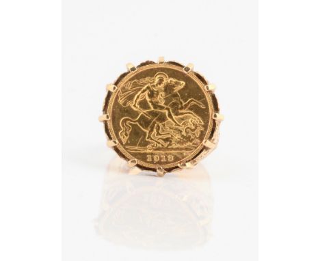 A George V 1913 half sovereign mounted in a hallmarked 9ct yellow gold ring mount, ring size R½, approx. weight 9.8g. IMPORTA