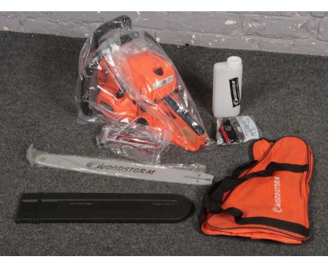 A boxed and unused Woodstorm chainsaw.  Model WS-5.2 Length of blade 50cm.