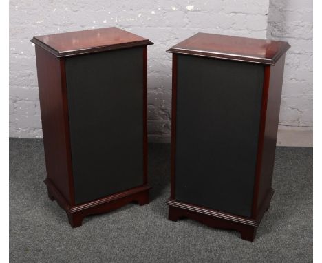 A pair of mahogany speaker cabinets.  