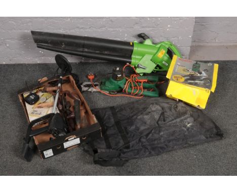 A collection of electrical tools and hand tools to include leaf blower, metal detector etc.  
