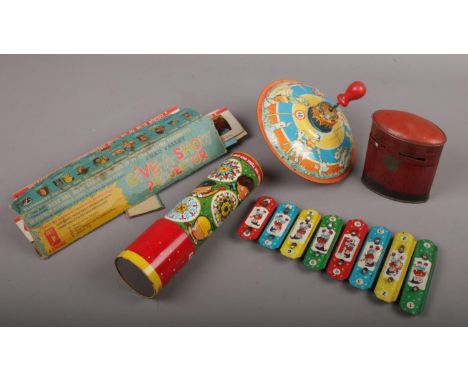 A vintage toy tinplate spinning top, xylophone and kaleidoscope, a George V Post Office money bank and a box of Chad Valley g