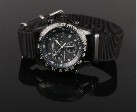 A gentleman's Timex Chrono Alarm chronograph watch on nato strap.  Not running.