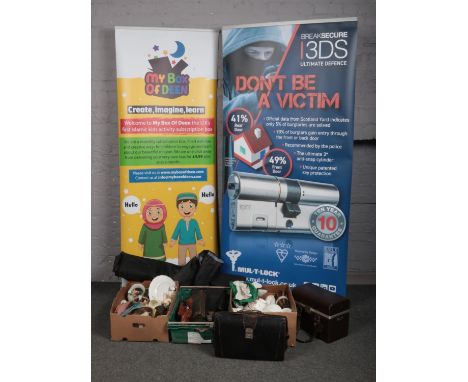 Three boxes of miscellaneous, to include promotional posters, bone china, camera case, wooden carved figure etc.  