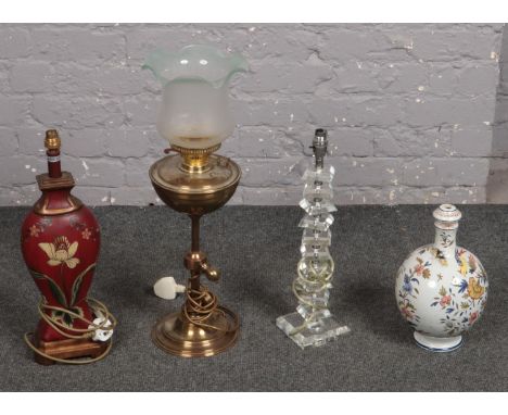 Three table lamps, glass, wooden examples to include ceramic vase base  