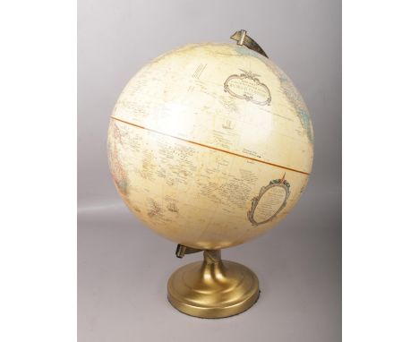 A Replogle 12 inch diameter globe on stand.  