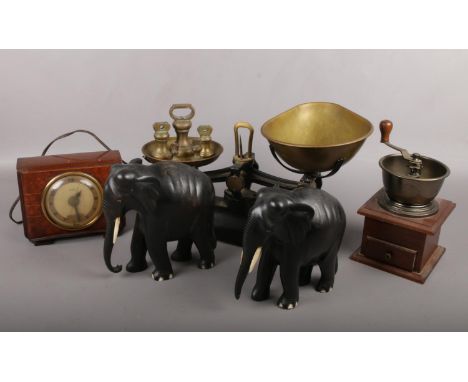 A set of Libra cast and brass kitchen scales, Hammond synchronous electric clock, pair of ebony elephants and a coffee grinde