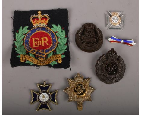 A quantity of army cap badges to include Royal army service, enamelled silver example etc.  