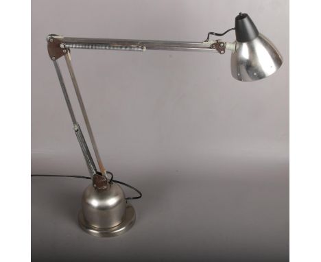 A chrome angle poise lamp.  