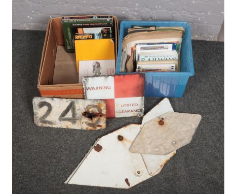 Two boxes of railwayana, to include enamel clearance sign, signal arms, books, manuals etc.  