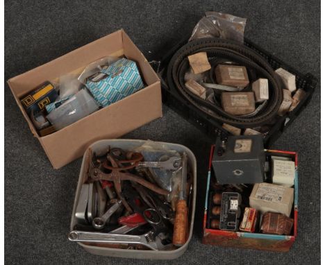 Four small boxes of tools and electrical spares.  